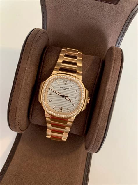 A LADIES PATEK NAUTILUS DIAMOND SET MODEL 7118/1200R-001 - Carr Watches