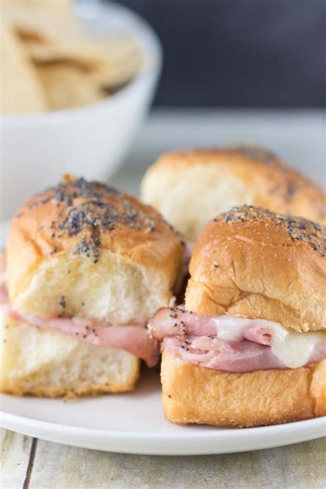 Cats often love cheese, and the protein in it can be good for them. Hawaiian Roll Ham and Swiss Cheese Sliders • Rose Clearfield