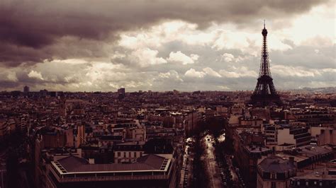 Paris Eiffel Tower On Side On Cityscape Of France With Background Of