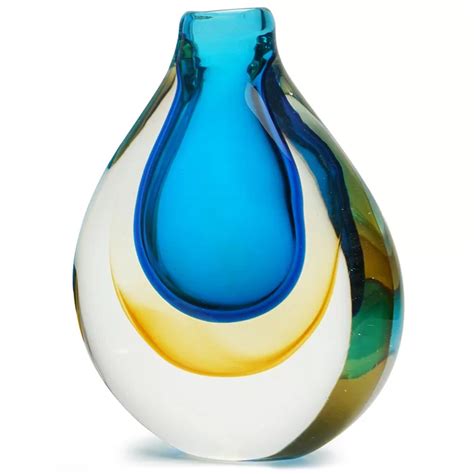 Clear glass vase hand cut with a dimple pattern. Dynasty Gallery Halo Glass Teardrop Table Vase | Perigold ...