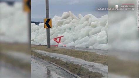 Wind Blows Massive Ice Boulders Over Retaining Wall