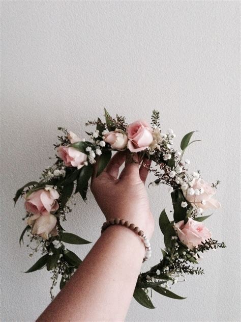 Carry your flower choice throughout the wedding by adding flowery details to your save the dates and thank you cards. Bohemian Flower Crown // Light pink roses, baby's breath ...
