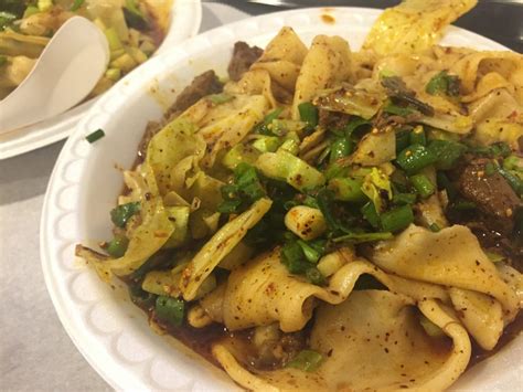 Xi'an famous foods' spicy cold skin noodles are vital nyc summertime eating. Xian Famous Foods NYC - Candid Cuisine