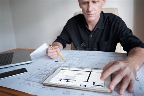 Architect Examining Blueprint Stock Image Image Of Draft Table