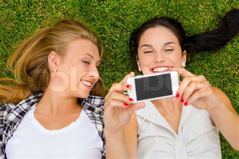 Best Friends Taking Selfies Stock Image Colourbox