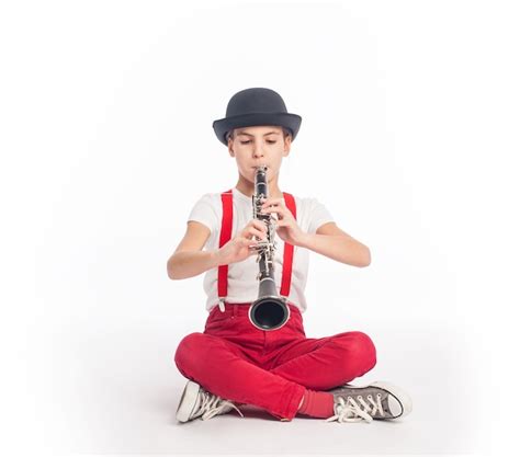Premium Photo Little Girl Playing Clarinet