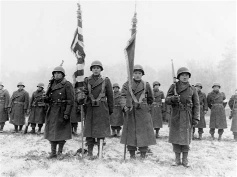The 442nd Regimental Combat Team Shown Here In A 1944 Photo Taken In