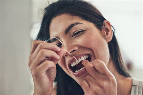 floss daily and brush your teeth twice a day small goals for a healthier new year popsugar