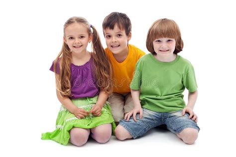 Happy Kids Sitting On The Floor Stock Photo Image Of Sitting Cute