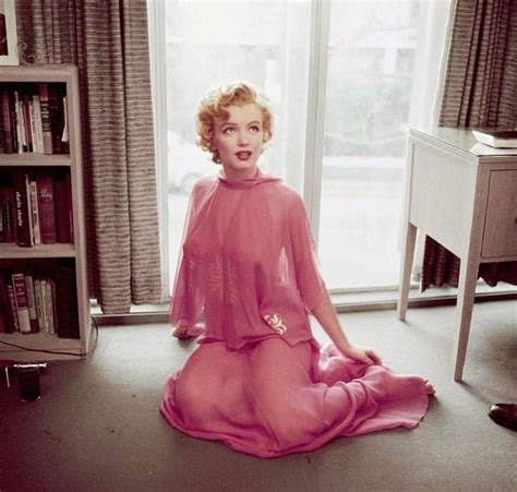 Marilyn Monroe Posing For A Photo In Her Apartment In Taken By