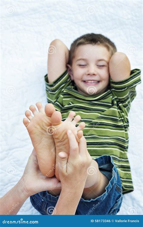 Boy Happy Funny Tickling Feet Stock Photo Image Of Feet Funny 58173346