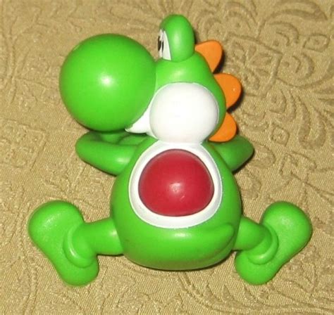 Supper Mario Broth “musical Yoshi” Toy Available As Part Of A
