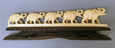 Ivory Elephants In A Row Antiques Board