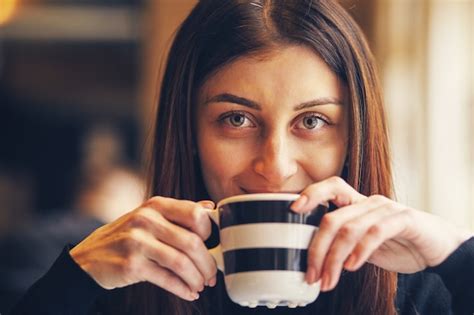 Premium Photo Woman Drinking Coffee In The Morning At Restaurant