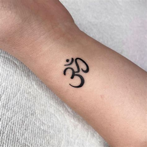 20 Spiritual Om Tattoo Designs Ideas For Both Men And Women Om Tattoo Design Om Tattoo