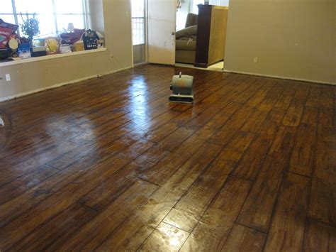 Paint on the basement concrete floor is actually more durable and lasts for a long period of time. faux wood | Concrete floors, Painted concrete floors, Diy ...