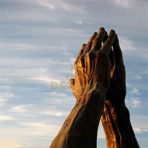 Giant Praying Hands Statue