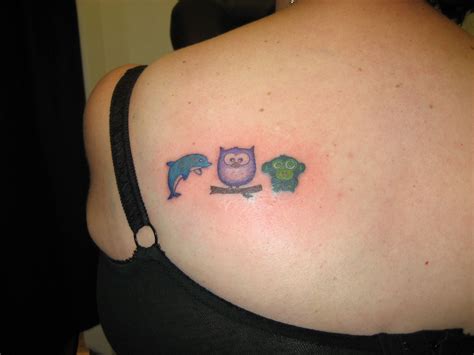 Dolphin, Owl and Monkey - representing mother and two children! | Tattoos for kids, Tattoos ...