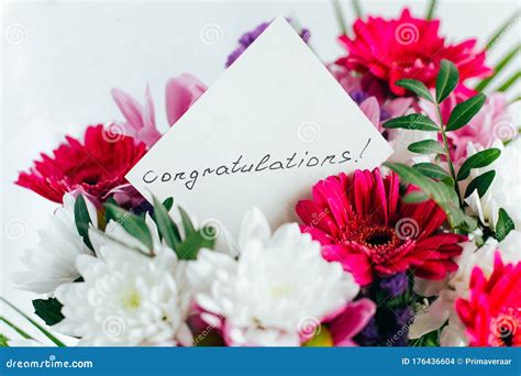White Card For A Bouquet With The Inscription Congratulations In A