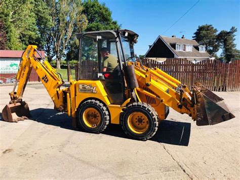 Jcb 1cx Backhoe Digger Cw Four In One Bucket