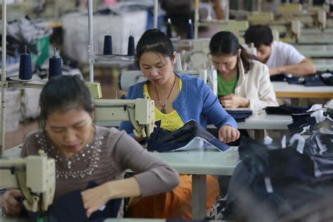 Rise of the sewbots: Asian factory workers feel chill winds of ...