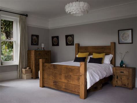 Plush bed decorations enhance this warm grey bedroom ideas. Plank Wooden Bed. If I could afford to, my house would be ...