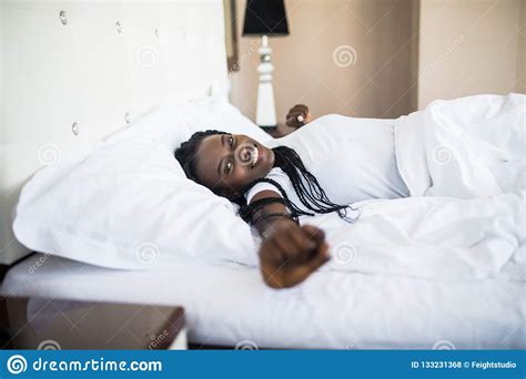 Lets Start New Day Top View Of Beautiful Young African Woman In Tank Top Lying In Bed And