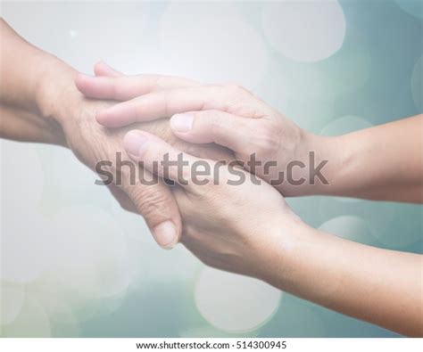 Caregiver Carer Hand Holding Elder Hand Stock Photo 514300945