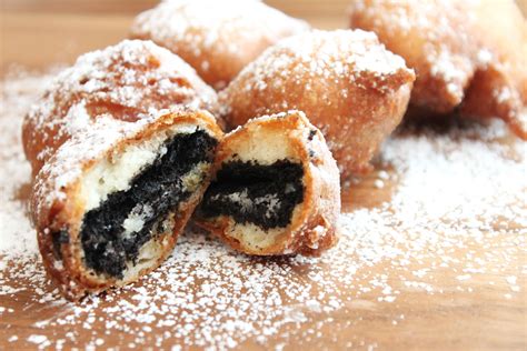 Remove fried oreos from basket and dust with powdered sugar while warm. Fried-Oreo | Created by Diane