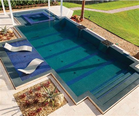 Pool With Shallow Lounge Chairs Submersed In Water Pool Pinterest