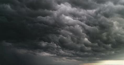 Aerial Dark Ominous Grey Storm Clouds Dramatic Sky Lighting In Dark