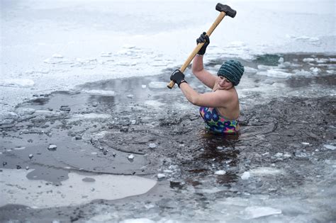 Scotland Weather Swimmer Smashes Way Through Frozen Loch With