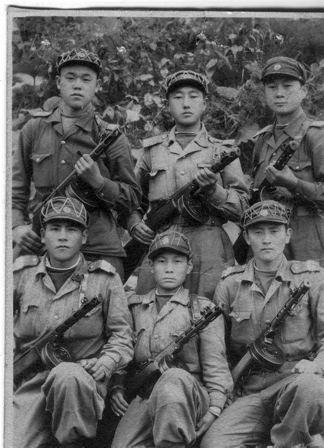 A Group Of North Korean Soldiers Pose For A Photo During The Korean War