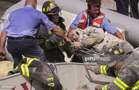Fdny Firefighter Photos And Premium High Res Pictures Getty Images
