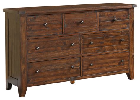 It's made from solid wood and features tapered block feet with turned details and crown molding for a traditional silhouette. Solid Wood Dressers - redboth.com