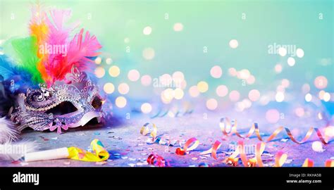 Carnival Mask With Blurred Streamer Party Confetti And Bokeh Stock