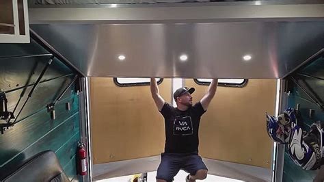 Bed Lifts To Ceiling In This Diy Stealthy Cargo Trailer Conversion