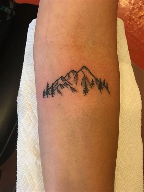 See more ideas about mountain tattoo, tattoos, cool tattoos. Little mountains tattoo | Camping tattoo, Small mountain ...