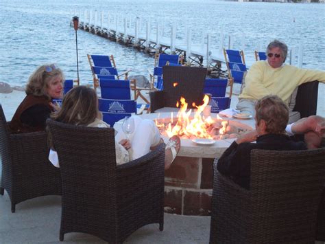 This fire pit from the harter collection further features an inner welded mesh screen to contain coals and sparks. lakeside dining amongst a fire pit on a beautiful fall day ...
