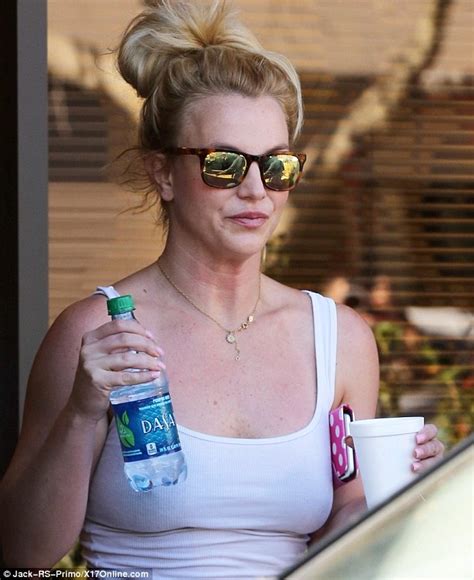 Britney Spears Shows Off Her Decolletage In Skimpy White Tank Top