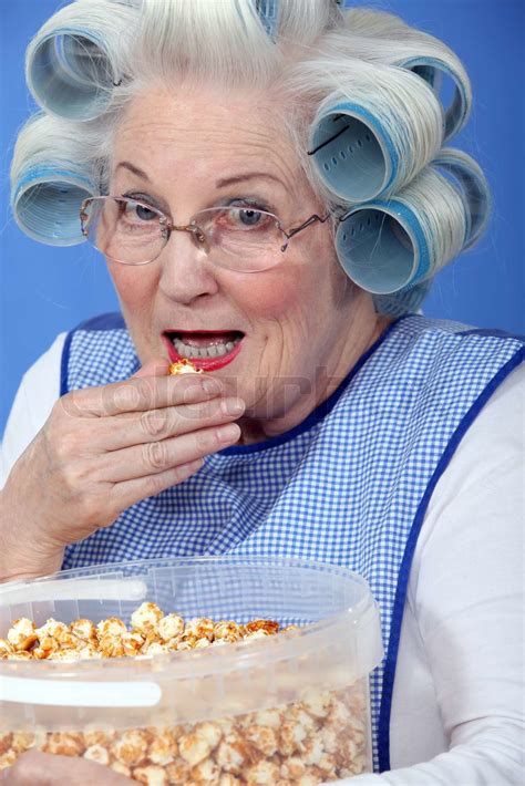 Woman Eating Popcorn Stock Image Colourbox