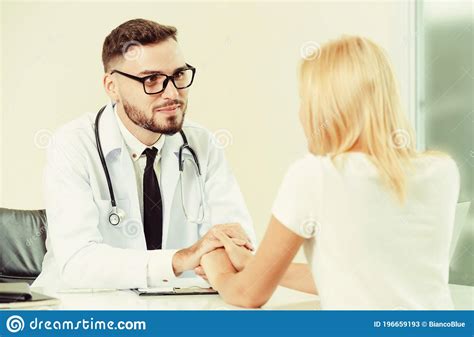 male doctor and female patient in hospital office stock image image of premedical hospital