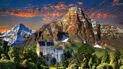 Neuschwanstein Castle In Mountains Wallpaper Download 2560x1440
