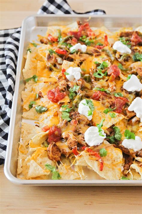 Place chicken into a mixing bowl. The Baker Upstairs: Chicken Fajita Nachos