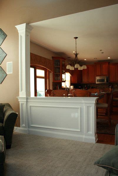 By opening the wall and allowing the sightlines to expand beyond the kitchen, you create the perception of more space without the cost of creating more square footage. Half wall with column against wall | Home remodeling ...