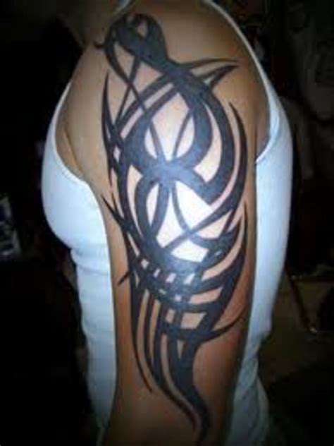 Tribal tattoo meanings tribal tattoos are very popular today. Tribal Arm Tattoos And Arm Band Ideas With Images For Men ...
