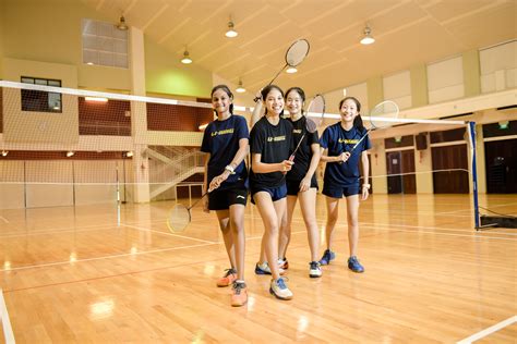 The sport is played indoors and the pinnacle comes from its olympic events. Badminton