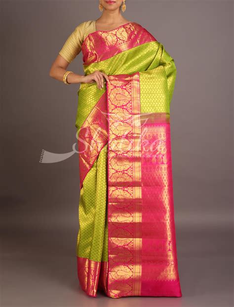 Vasudha Parrot Green With Contrast Pink Ornate Border Pallu Pure