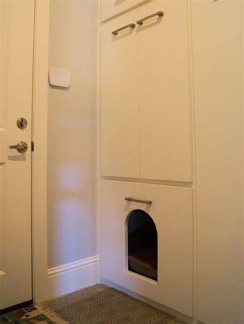 You can use a covered litter box, a cabinet or piece of furniture, or other items to hide the litter box. Cat Litter Box | Houzz
