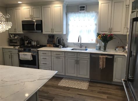 Are you looking to update your kitchen cabinets? Westchester ny kitchen renovation using white cabinetry ...